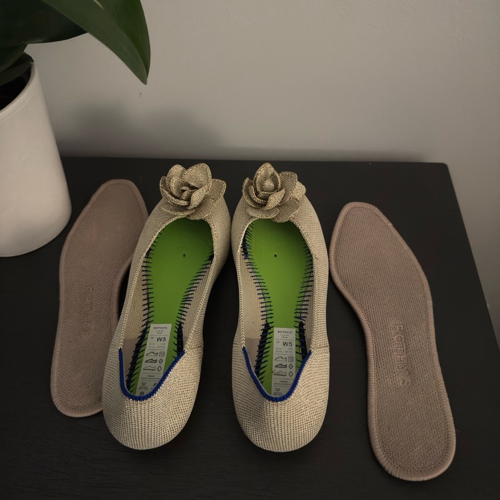 Rothy's Beige Flats with Gold Floral Accent